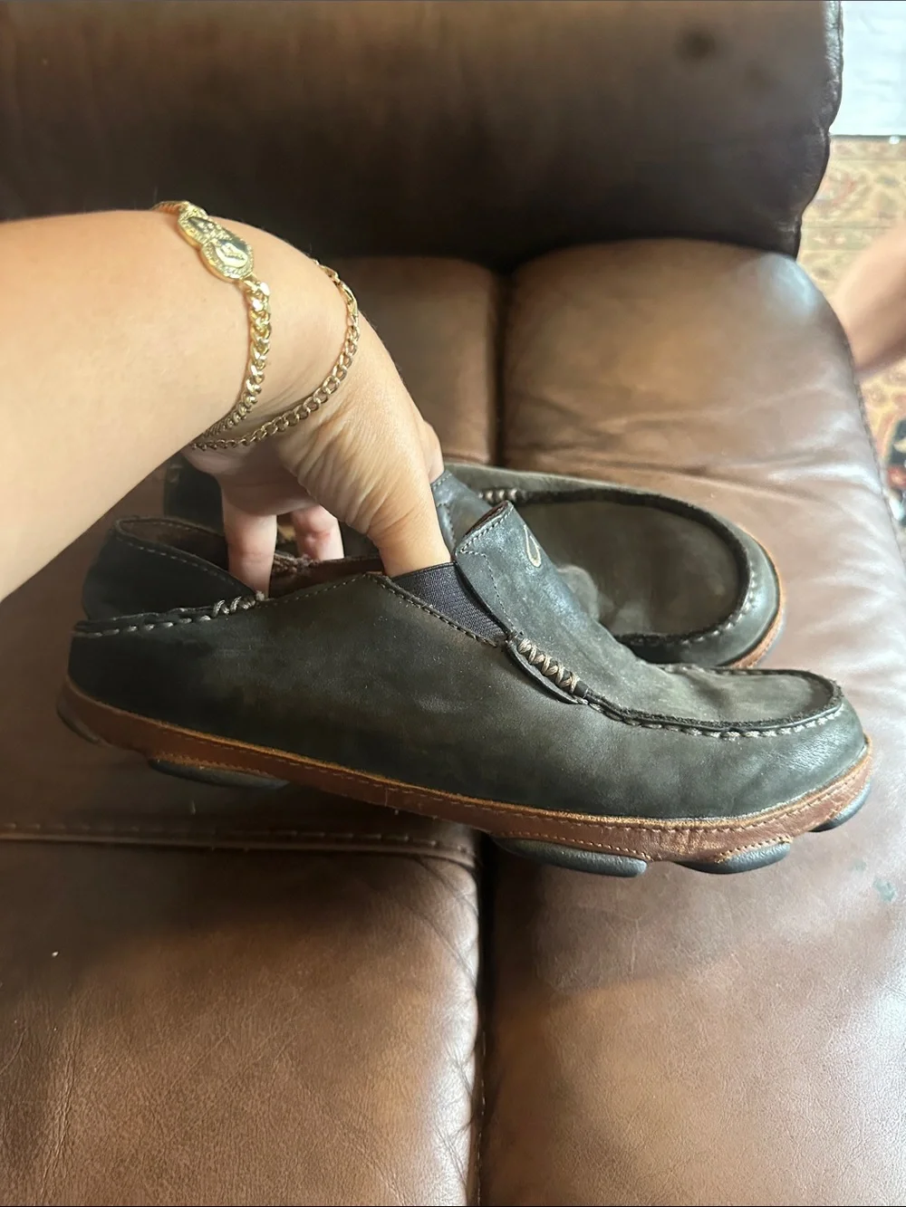 OluKai Men's Black Slip-On Loafers with Brown Trim
